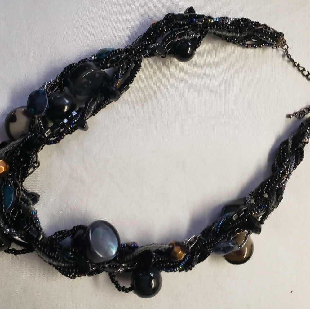 A black with blue beads necklace
